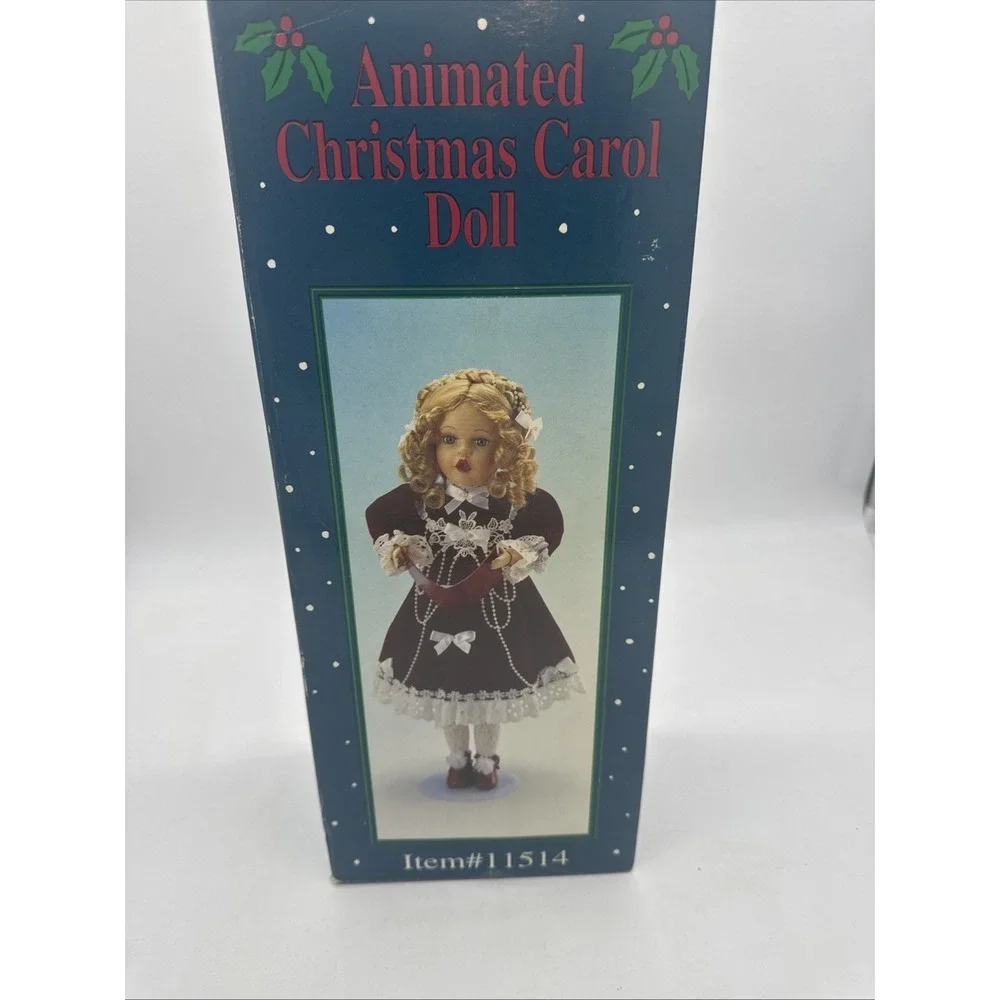 Animated Christmas Carol Doll‎